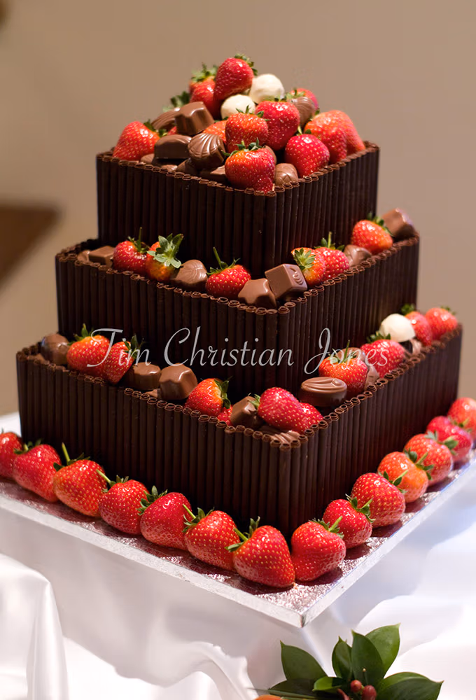 Wedding details and colour captured, unedited - Strawberries and chocolates for a perfect wedding cake.