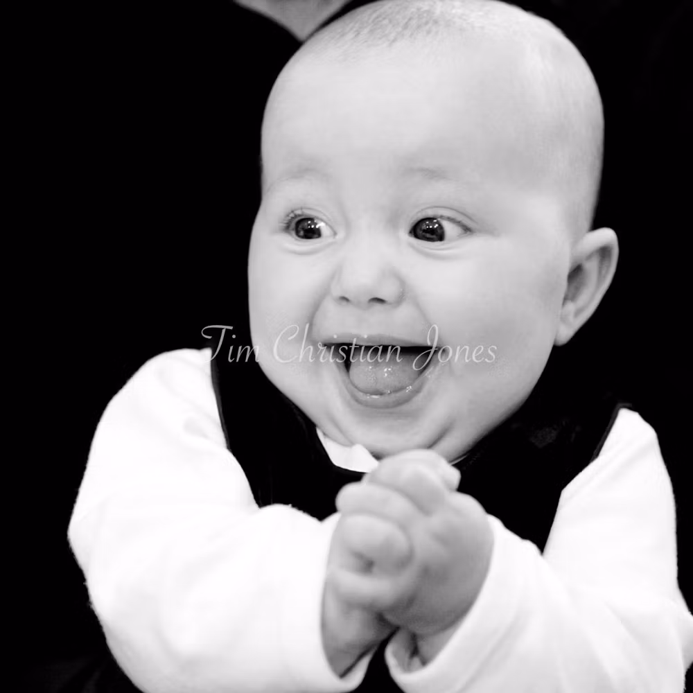 Baby in fits of laughter as I pointed the camera close to her. A beautiful wedding moment captured during the wedding breakfast