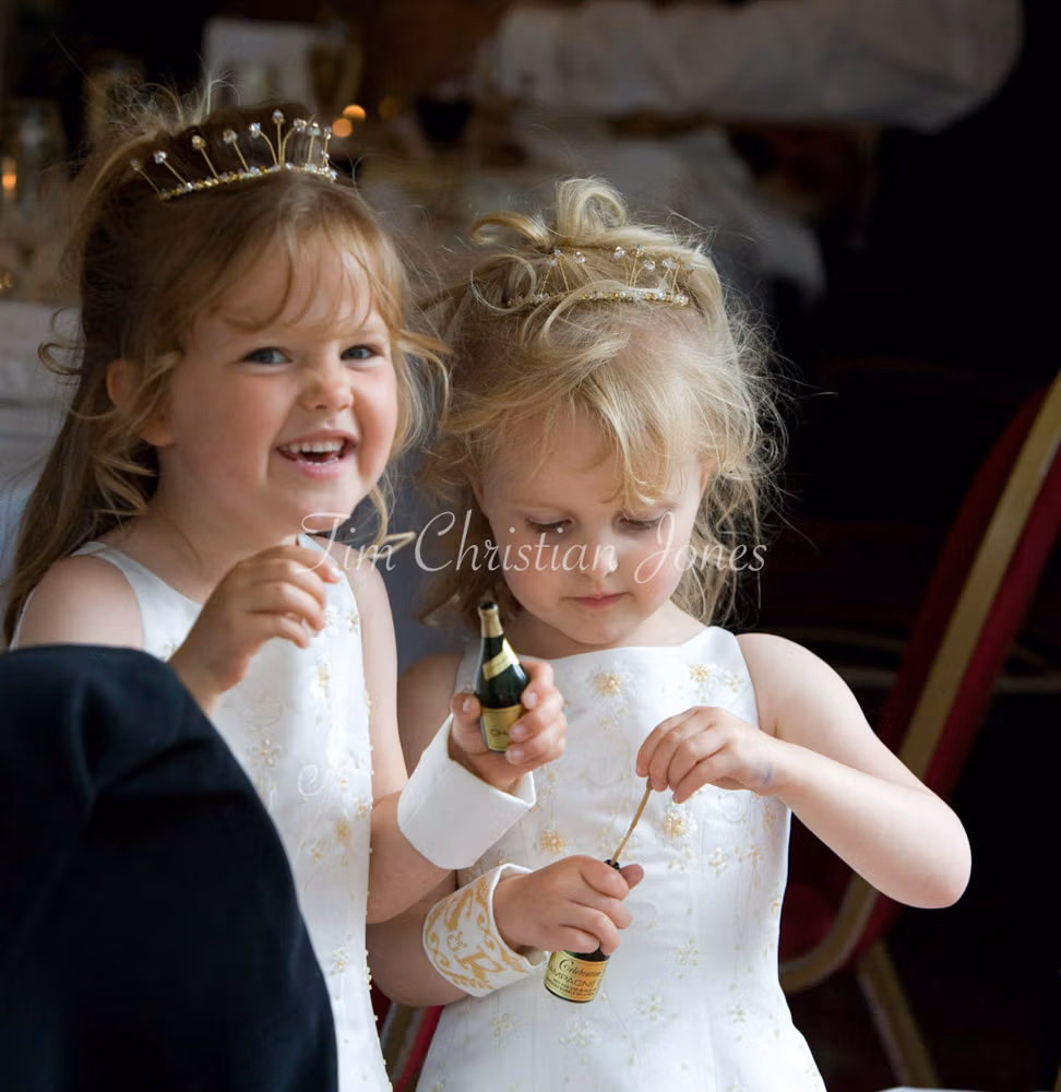 Bridesmaids getting ready to blow bubbles during the wedding breakfast