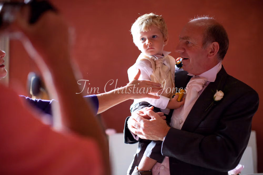 The couple’s son with grandpa before the ceremony at this Stourton wedding venue