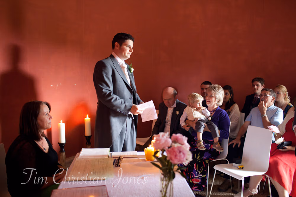 Best man reads a heartfelt passage during the ceremony at the Temple of Apollo